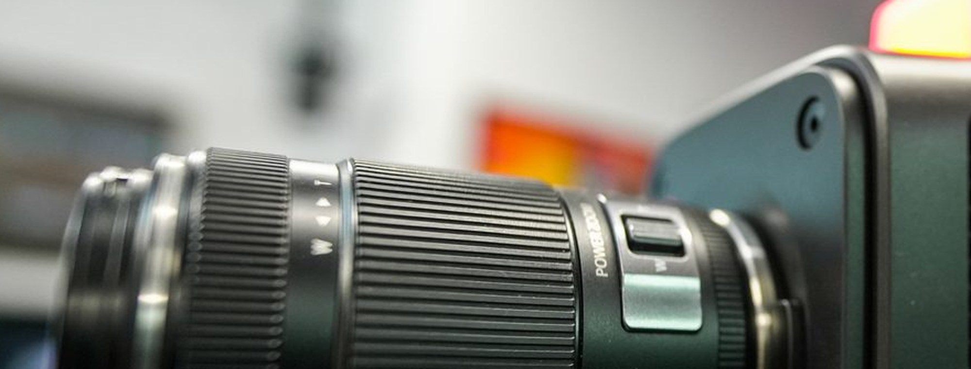 The marked barrel of a zoom lens, focal distances in focus